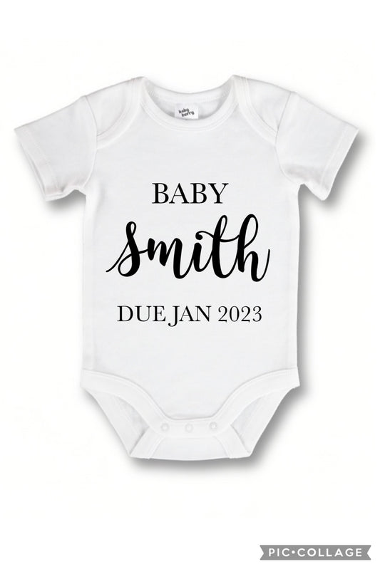 Pregnancy announcement onesie